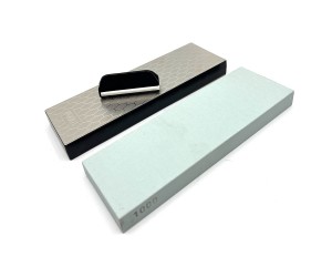 Sharpening stone with knife attachment